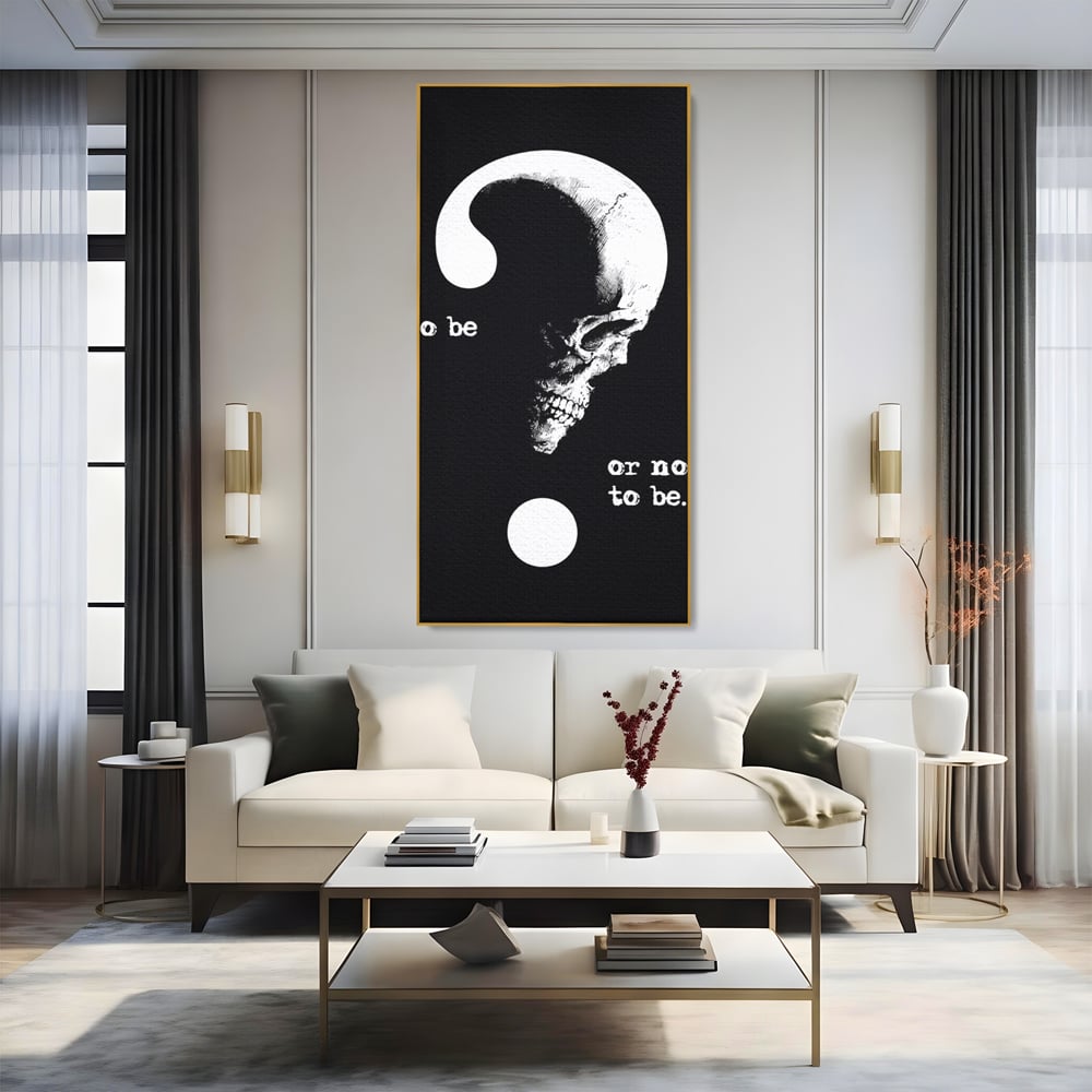 Tablou canvas cu tablou canvas cu craniu si semnul intrebarii, in rama de aluminiu auriu, pe perete intr-un living